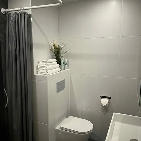 Appartement Cozy Center With Gym & Terrace